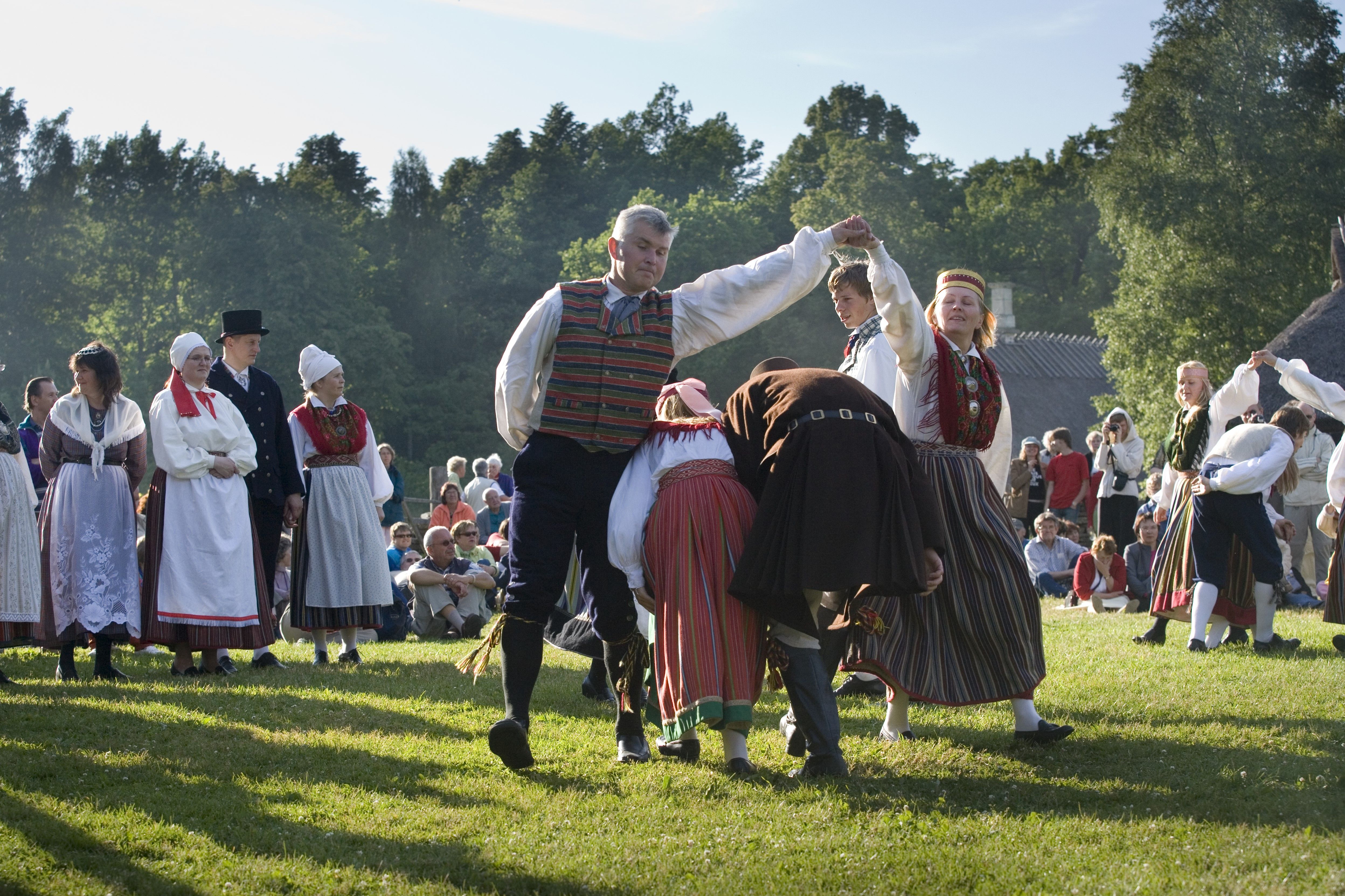 Estonian folk dancers in traditional costumes 