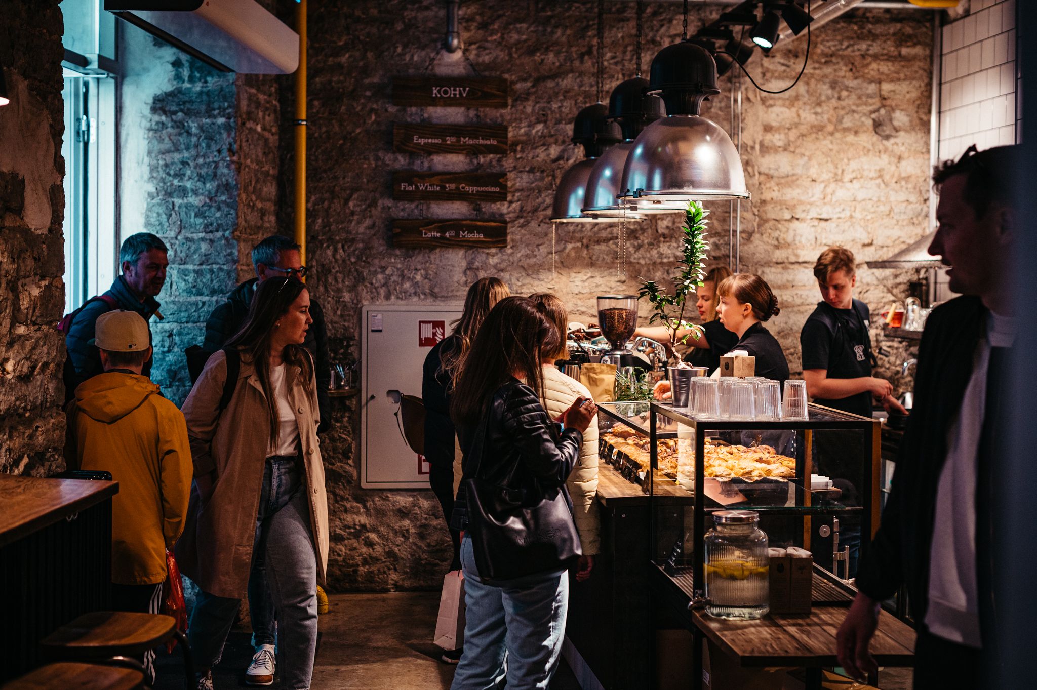 People waiting in line at Röst bakery in Tallinn, Estonia.