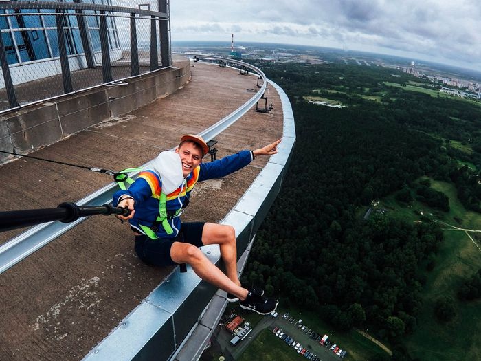 A young man taking a selfie on top of Tallinn TV Tower, the highest building in Estonia Photo: Jorden Tually